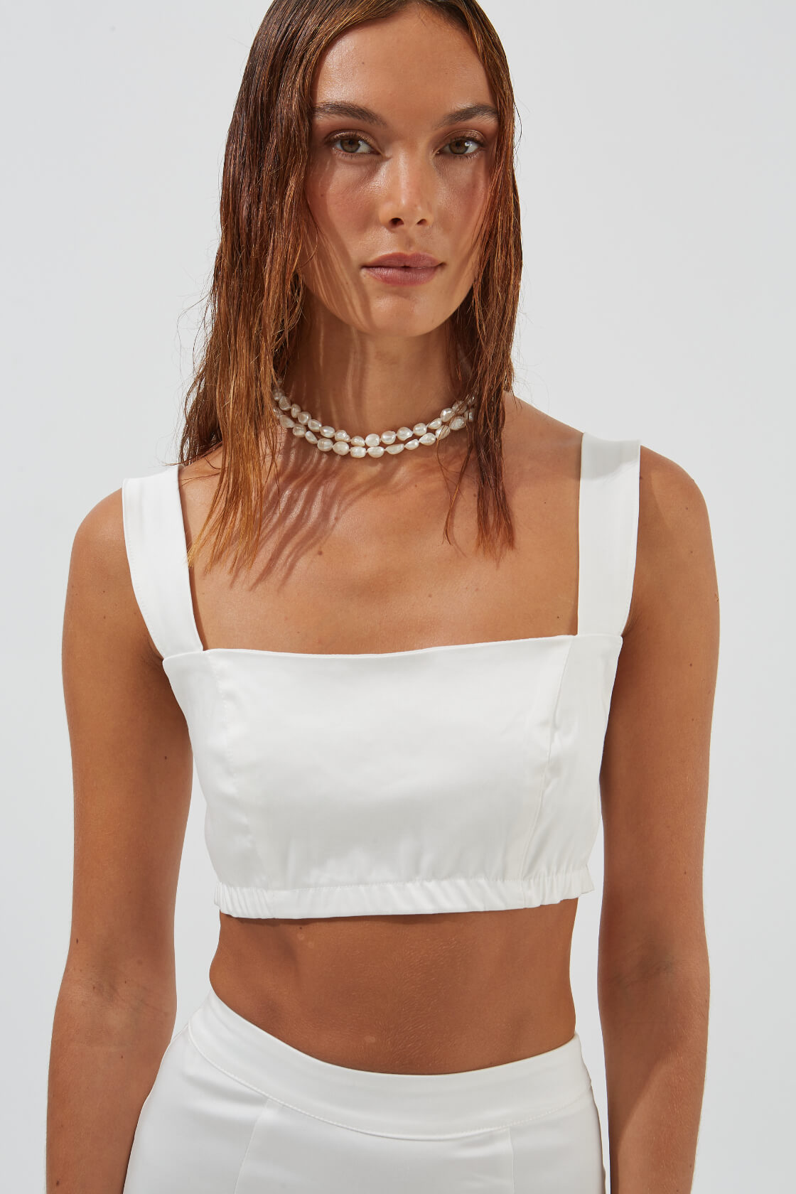 Clover elastic cotton-tencel cropped bustier top